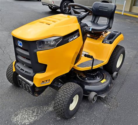Used Scratch And Dent Cub Cadet XT1-LT46 Lawn Tractor, 2022, item number 13AQA9TTA10, 23 HP 725cc Kohler 7000 engine, 46" 2 blade 12 gauge stamped steel deck, foot pedal controlled Tuff-Torq TL-200 transmission. . Used cub cadet xt1 46 for sale